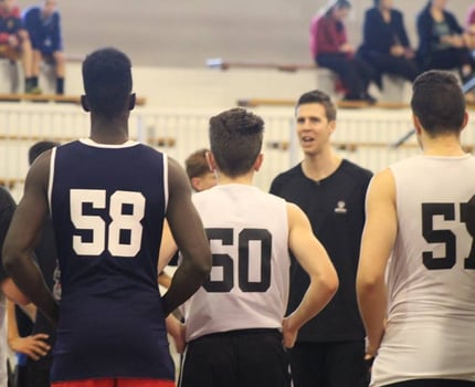 Tall Black Tom Abercrombie taking some local high school players for a session